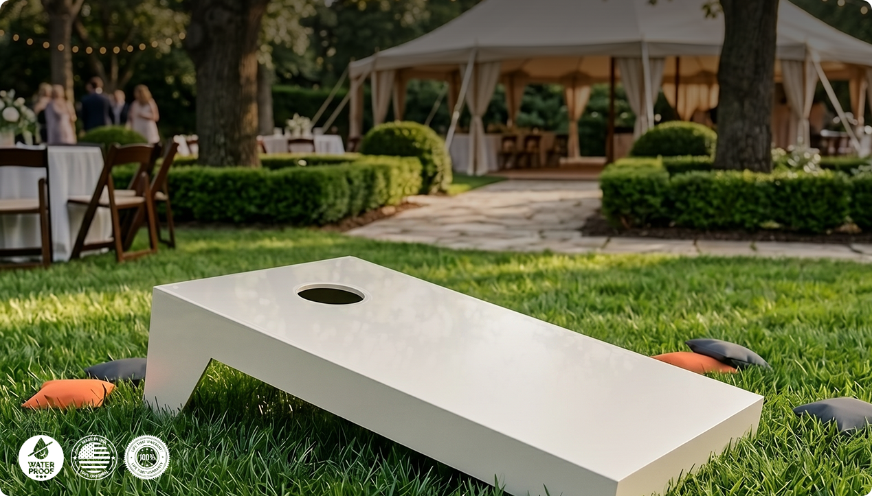 Cornhole boards on grass at an outdoor venue